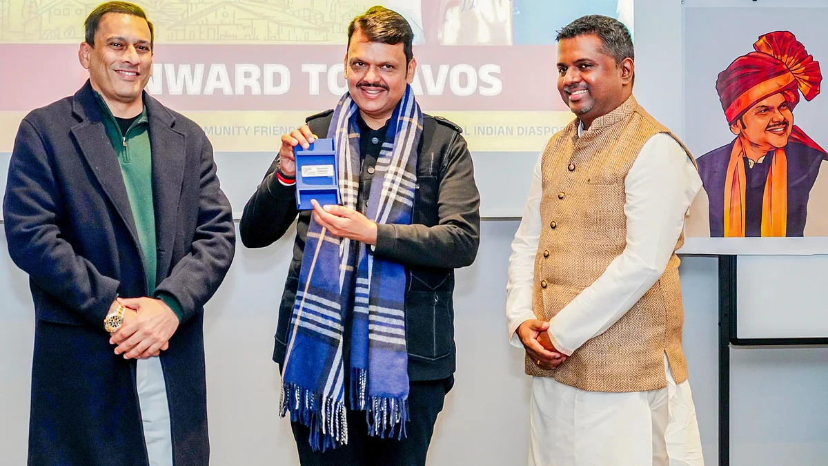 Devendra Fadnavis accepts the WEF badge at Davos