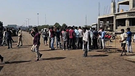 People gather near the steel plant in Chhattisgarh.