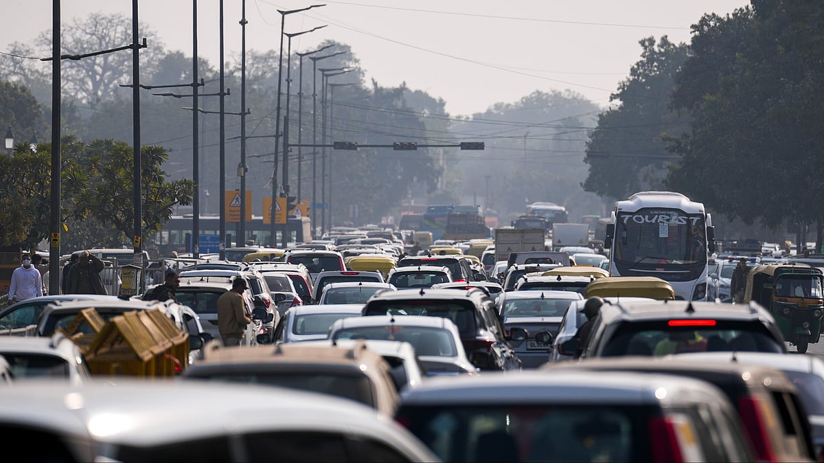 Vehicles move slowly amid heavy traffic congestion at Rafi Marg near India Gate, New Delhi.