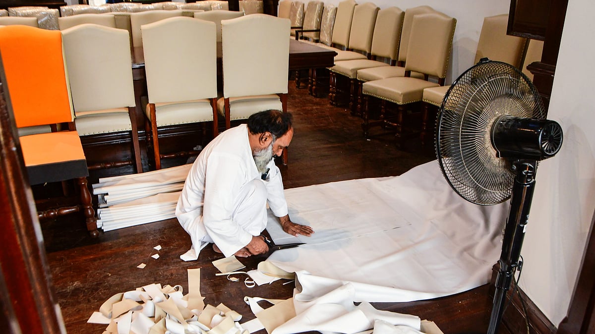 A worker prepares the BMC office ahead of the arrival of newly elected members, 20 Jan