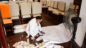 A worker prepares the BMC office ahead of the arrival of newly elected members, 20 Jan