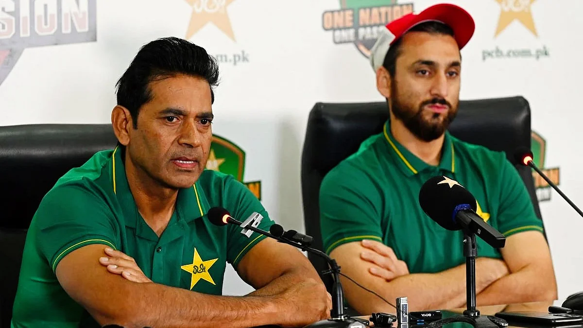 Pakistan skipper Salman Ali Agha (right) and Aaqib Javed