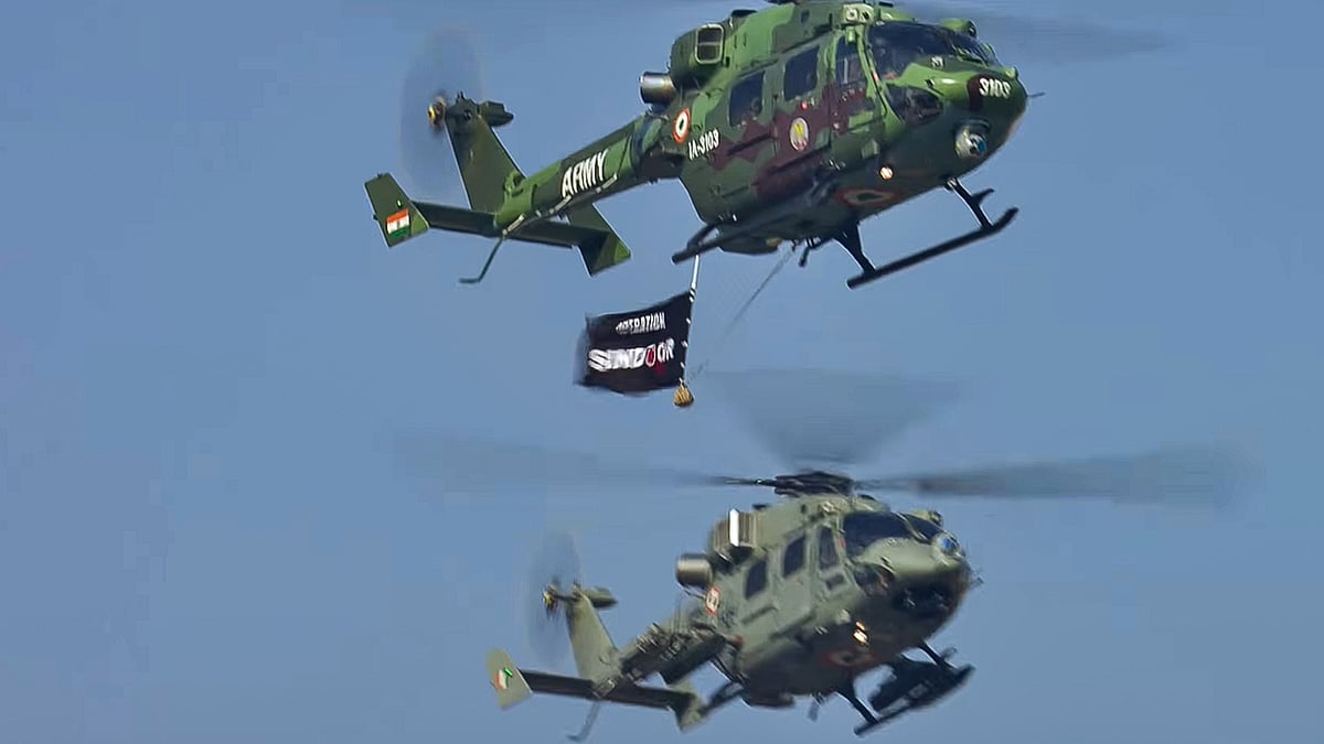 Military helicopters during the 77th Republic Day parade.