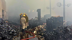 Fire crews battle lingering flames in West Bengal