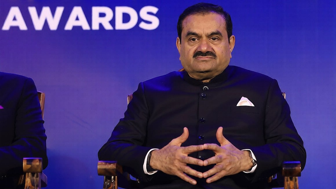 Former bureaucrat demands judicial probe into alleged Adani bribery scheme