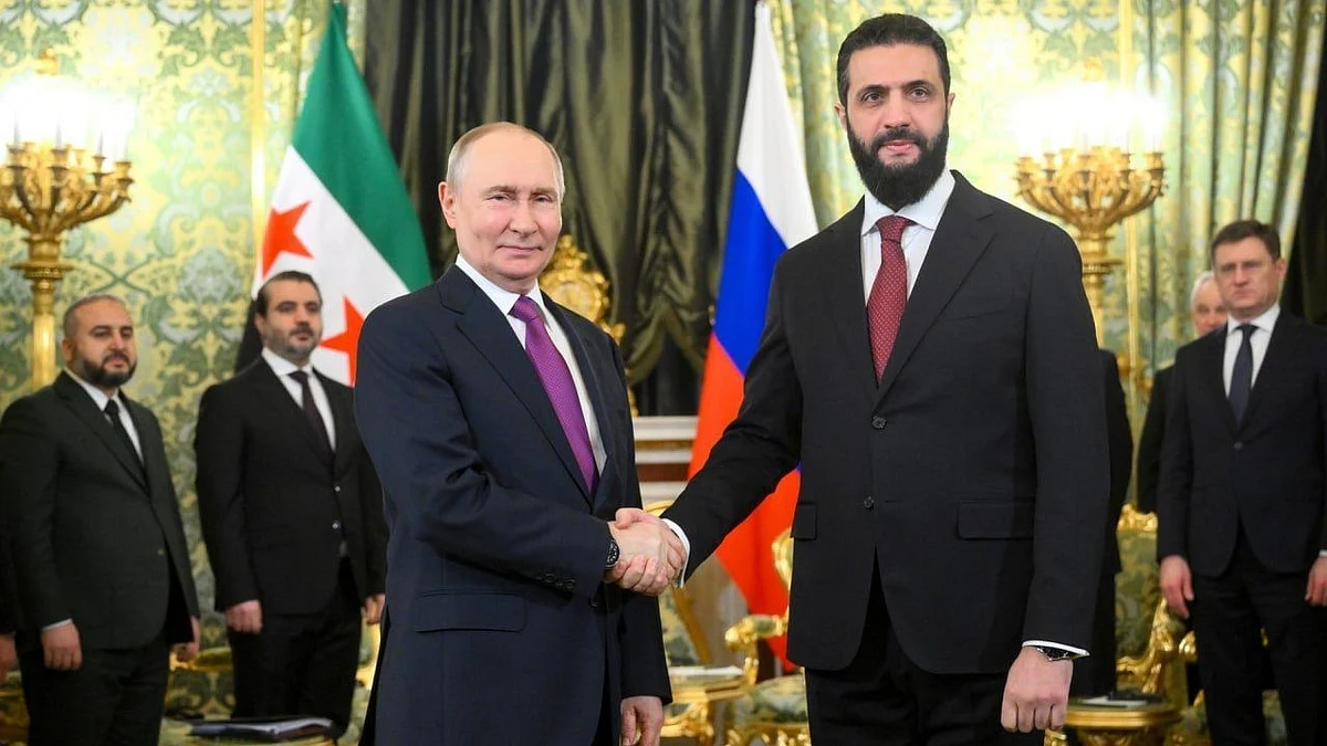 Russian President Vladimir Putin with Syrian President Ahmed al-Sharaa  