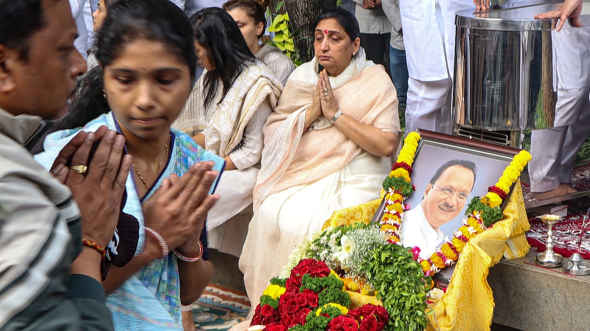 Sunetra Pawar, wife of Ajit Pawar, greets mourners in Baramati, Pune.
