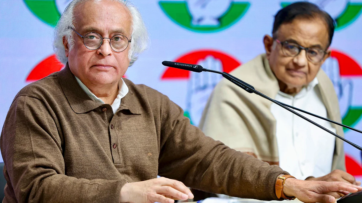 Jairam Ramesh and P. Chidambaram during a press conference in New Delhi.