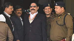 JD(U)’s Anant Singh takes oath as Bihar MLA, brought to Assembly in prison vehicle