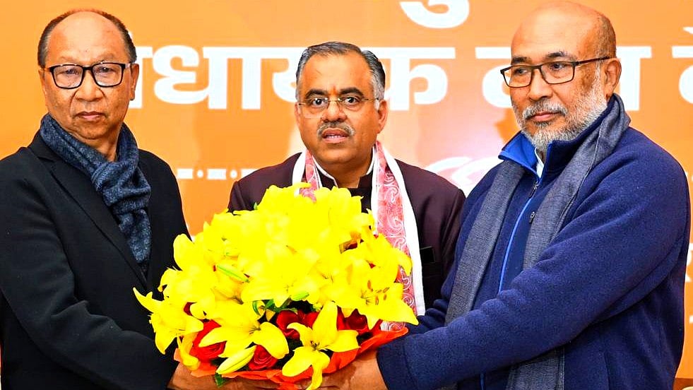 L-R: Y. Khemchand Singh with BJP national gen-secy Tarun Chugh and ex Manipur CM N. Biren Singh