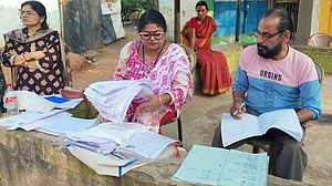 BLOs at work during the SIR process.