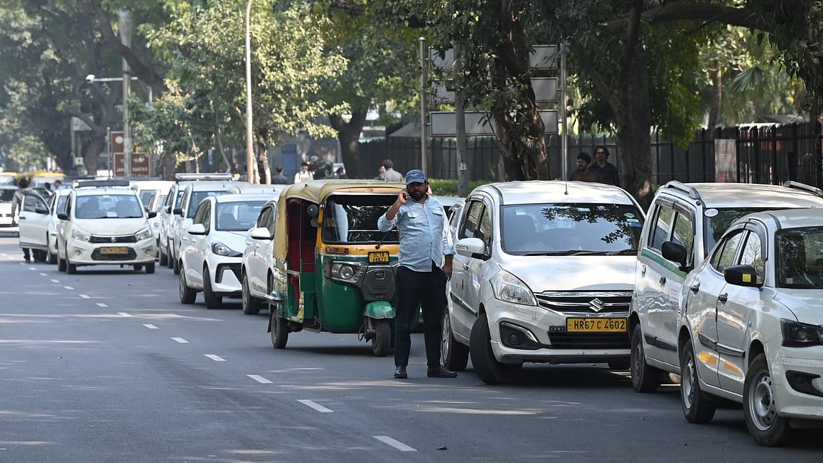 App-based taxis and autorickshaws line up along a roadside during a drivers’ protest in New Delhi.