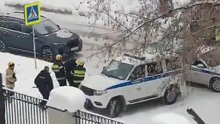 The accused in police custody.