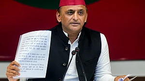 Akhilesh Yadav addresses a press conference in Lucknow.