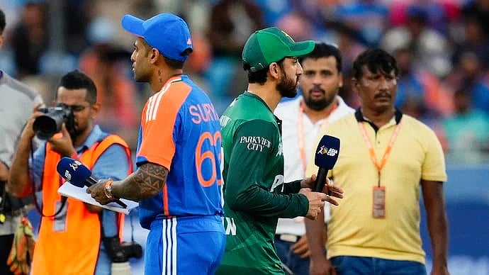 Cold vibes: Suryakumar Yadav (left) and Salman Ali Agha at the toss during the Asia Cup