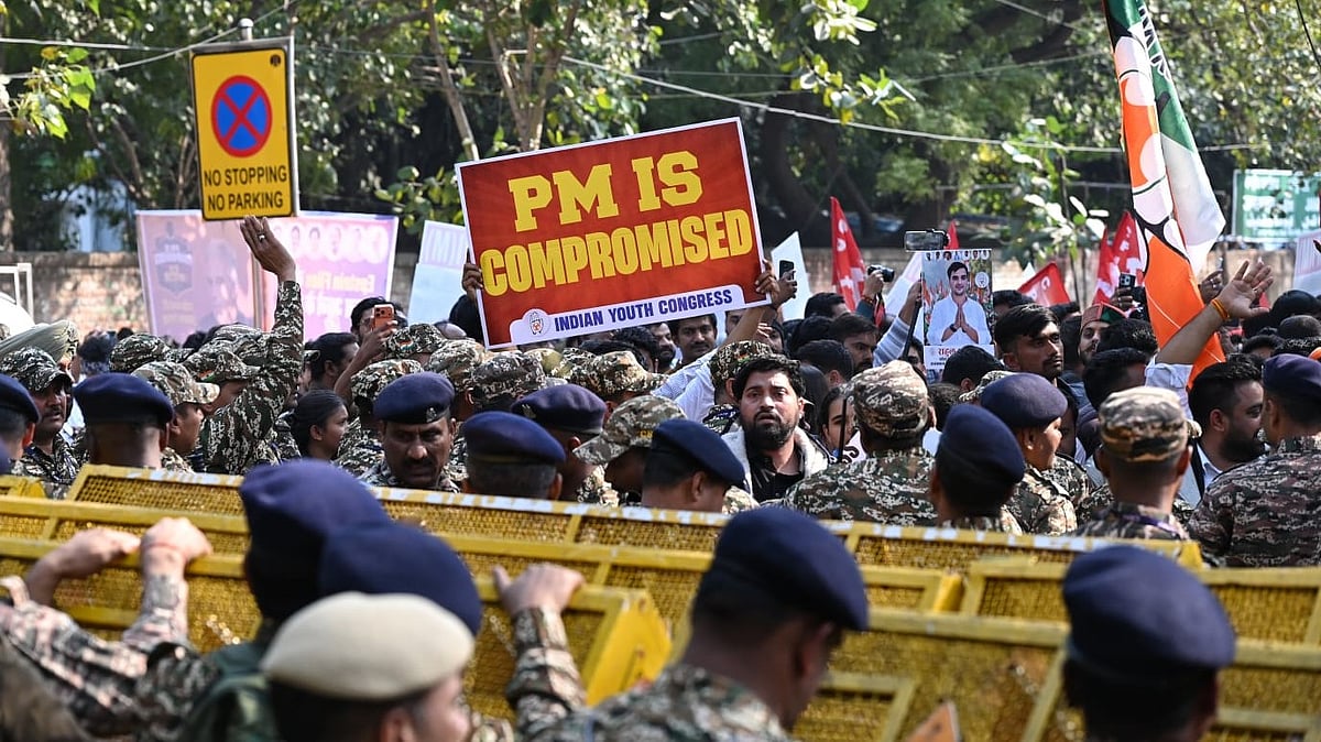A poster held up by a participant in the IYC protest