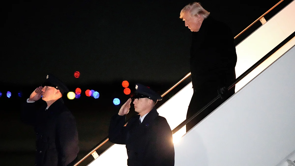Donald Trump steps off Air Force One, 9 Feb, at Joint Base Andrews