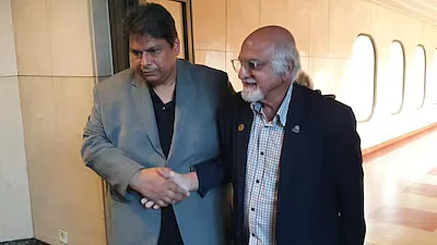Imran Khwaja, vice chairman of ICC (right), in Lahore for talks