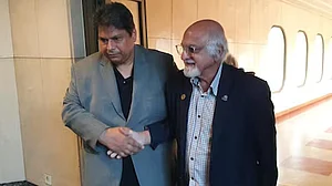 Imran Khwaja, vice chairman of ICC (right), in Lahore for talks