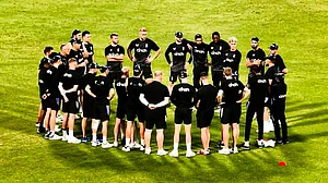 The England squad in a team huddle at Eden Gardens on Friday