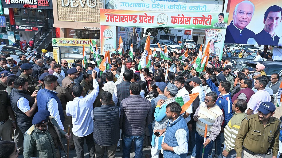 Congress workers and supporters protest in Dehradun.