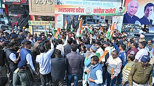Congress workers and supporters protest in Dehradun.