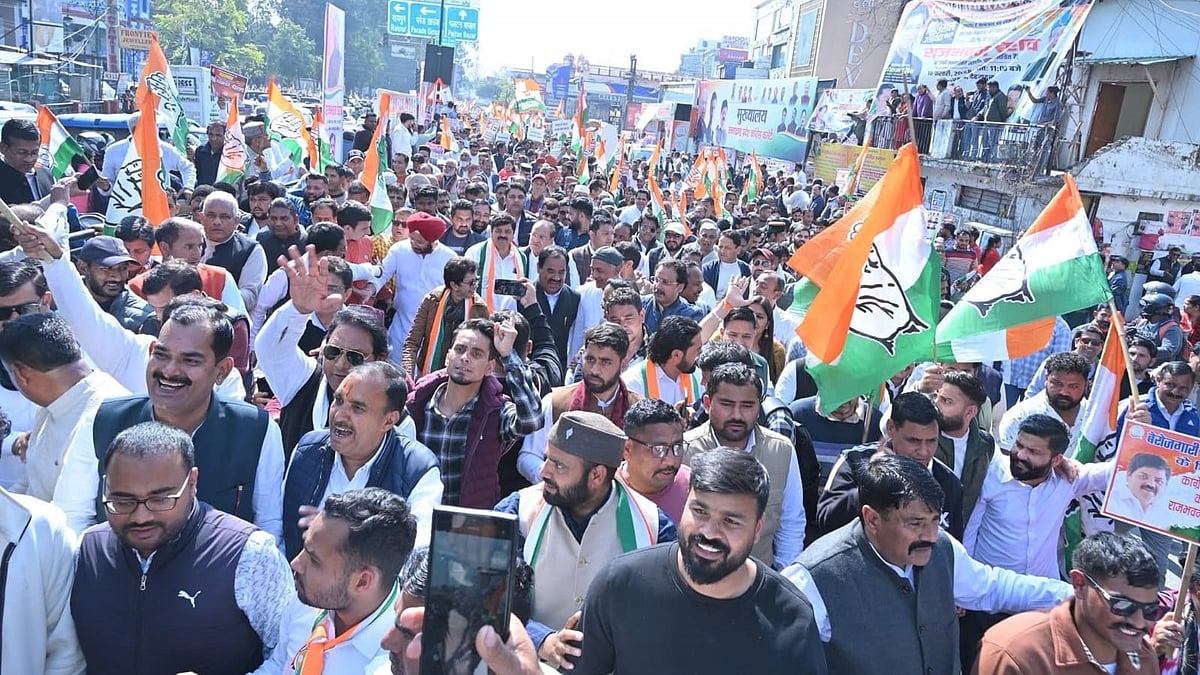 Congress leaders and supporters protest against BJP government during a demonstration.
