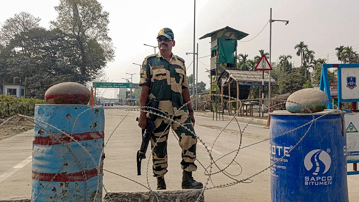 A security personnel stands guard amid heightened tensions in Bangladesh.