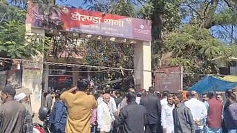 People gather outside Ranchi’s Doranda police station.