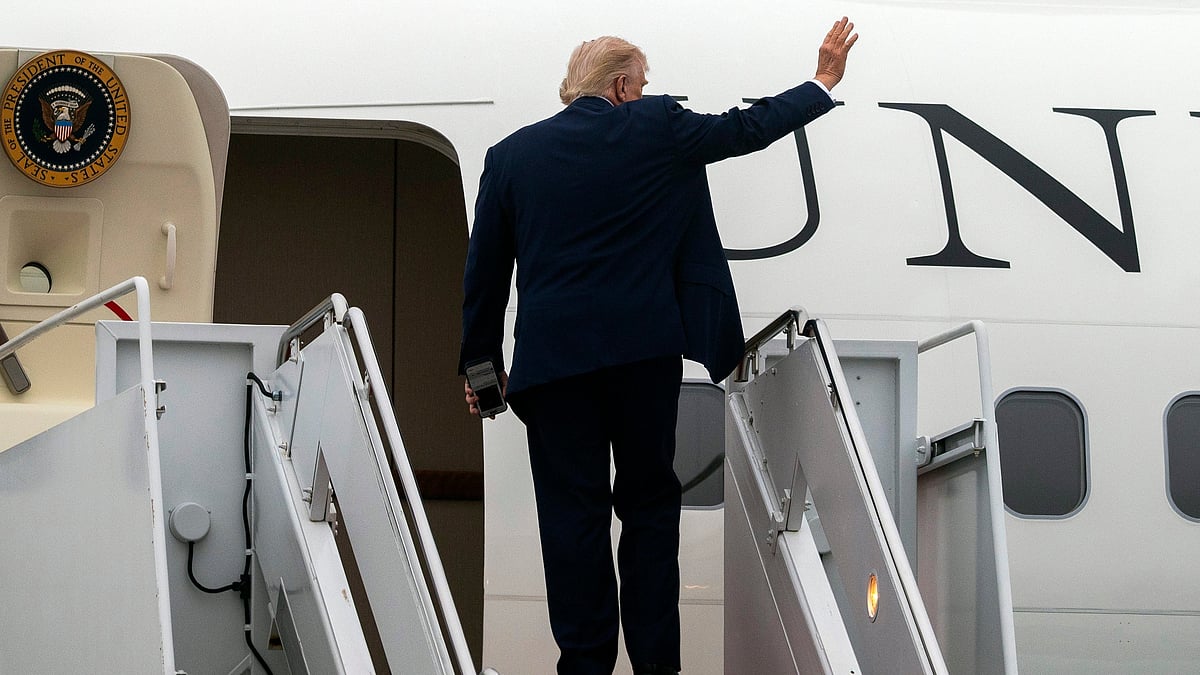 President Donald Trump boards Air Force One at Joint Base Andrews, 19 Feb