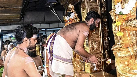 Priests offering prayers at Sabarimala temple