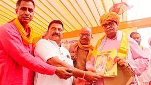 Rajasthan education minister Madan Dilawar (right)