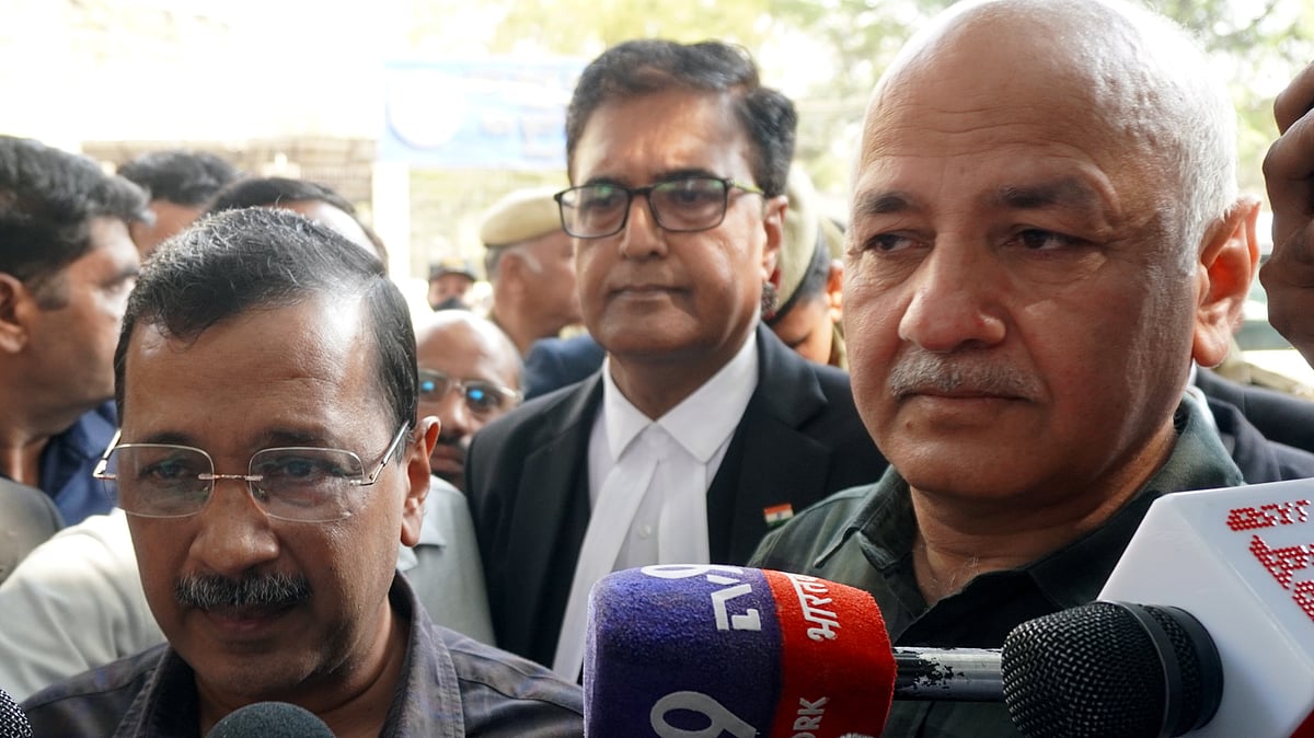 Arvind Kejriwal and Manish Sisodia address the media in New Delhi.