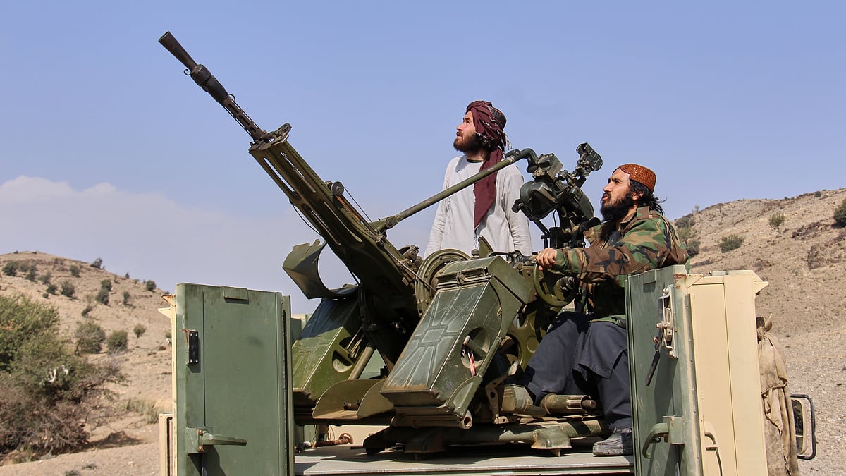 Taliban fighters in an armed pickup truck at a crossing with Pakistan in Khost, Afghanistan, 27 Feb