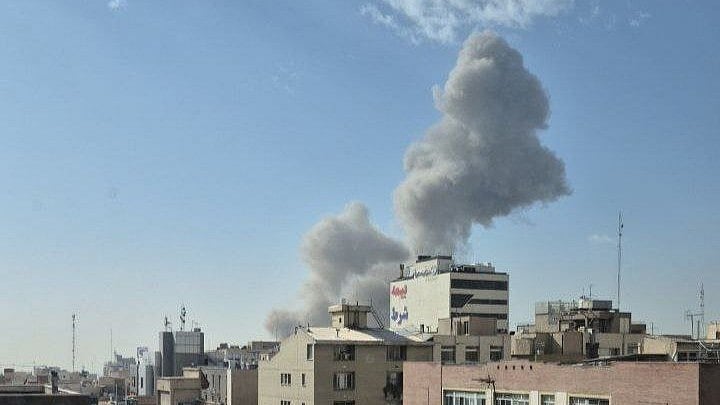 Smoke rises from a possible Israeli strike in Tehran
