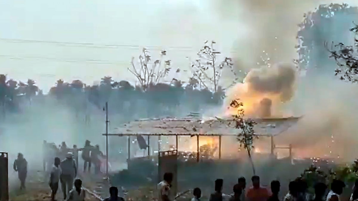 Smoke rises after a powerful blast at a crackers unit in Kakinada.