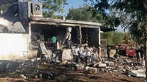 Debris and shattered structures after a powerful blast at an explosives factory in Nagpur.