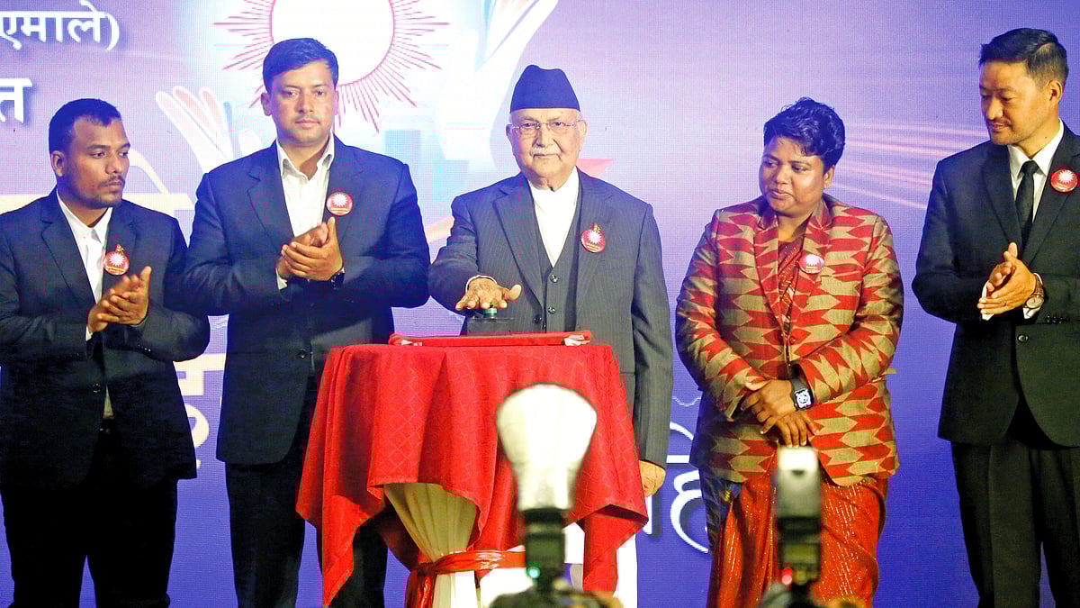 Former Nepal PM K.P. Sharma Oli unveiling his party’s election manifesto ahead of the elections