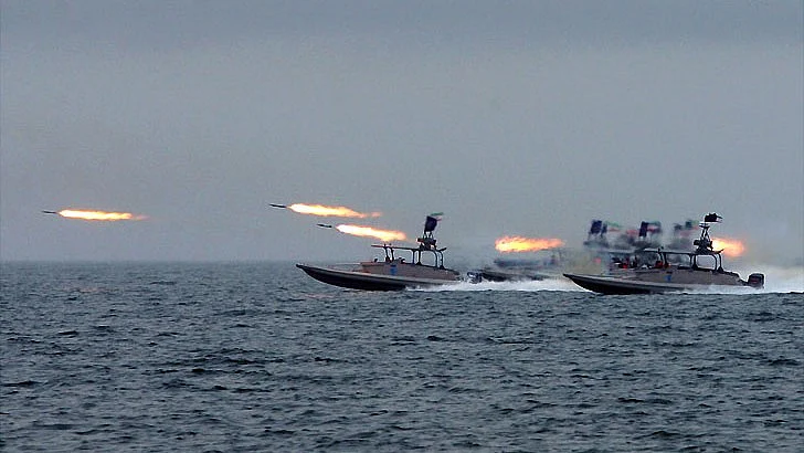 IRGC Navy firing projectiles into Strait of Hormuz. 