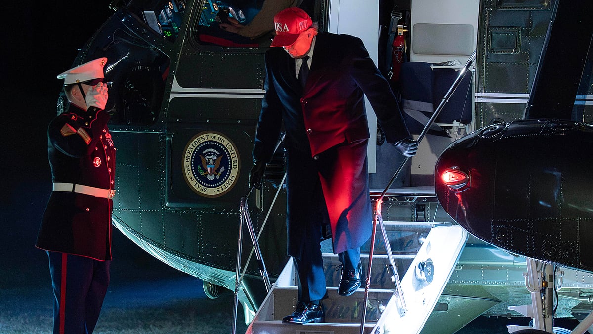 Donald Trump steps off Marine One as he arrives on the South Lawn of White House in Washington.