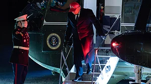 Donald Trump steps off Marine One as he arrives on the South Lawn of White House in Washington.