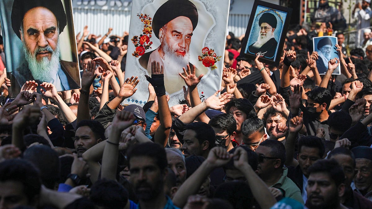 Members of the Muslim community protest near a mosque in Jammu.