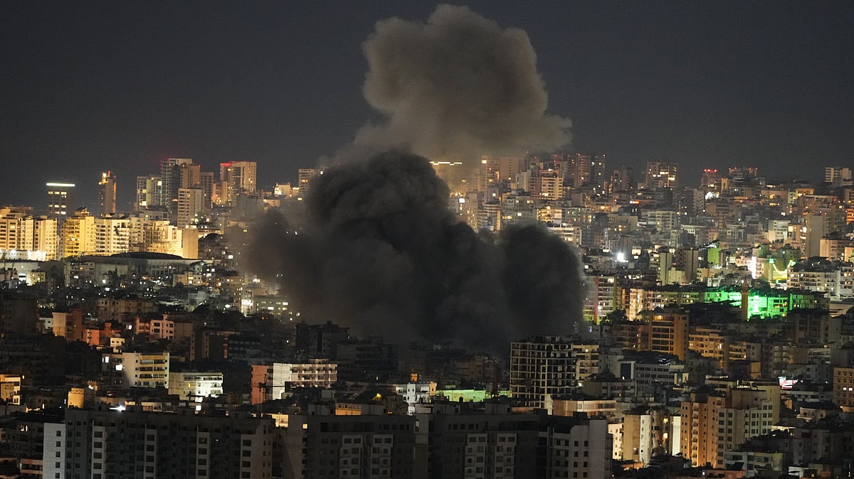 Plumes of smoke billow over Dahiyeh in Beirut’s southern suburbs after an Israeli airstrike.