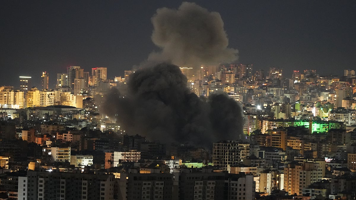 Plumes of smoke billow over Dahiyeh in Beirut’s southern suburbs after an Israeli airstrike.