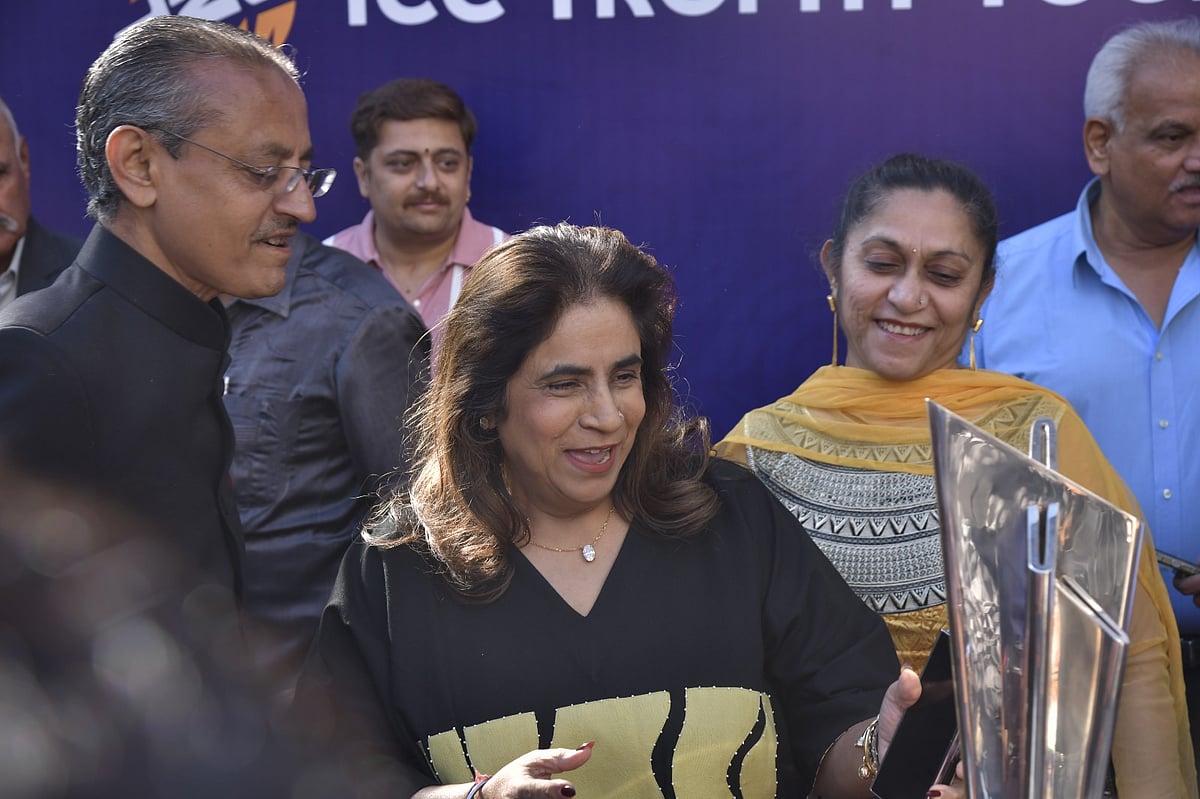 Dalbir Bumrah (C), the star's mother and sometime vice-principal, during the trophy tour