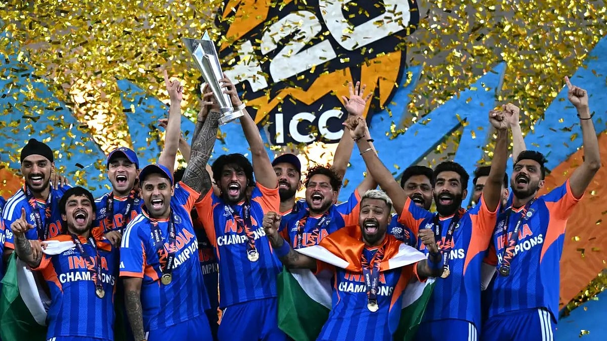 Jubilant  members of India's winning team with the trophy