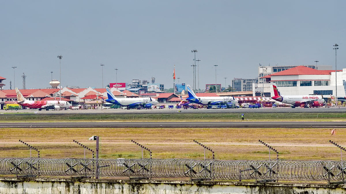 Passenger aircrafts at Kochi airport.