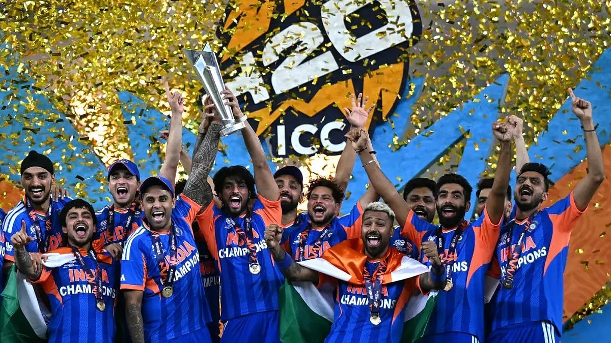 Jubilant  members of India's winning team with the trophy