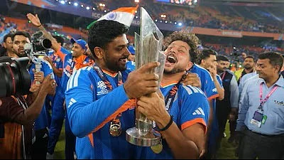 Trophy time: Sanju Samson, Player of the Tournament, with Kuldeep Yadav after the final