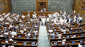 Opposition protest seeking debate in Lok Sabha on West Asia crisis.
